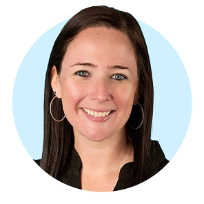 Smiling woman with long dark hair and hoop earrings